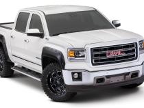 Black Pocket/Rivet Style Smooth Finish 4-Piece Fender Flare Set For 2016-2018 GMC Sierra 1500 (Incl Limited) Fits 69.3 Inch Bed Bushwacker