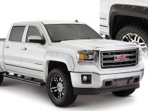 Black Boss Pocket/Rivet Style Smooth Finish 4-Piece Fender Flare Set For 2016-2018 GMC Sierra 1500 Fits 69.3 Inch Bed Bushwacker